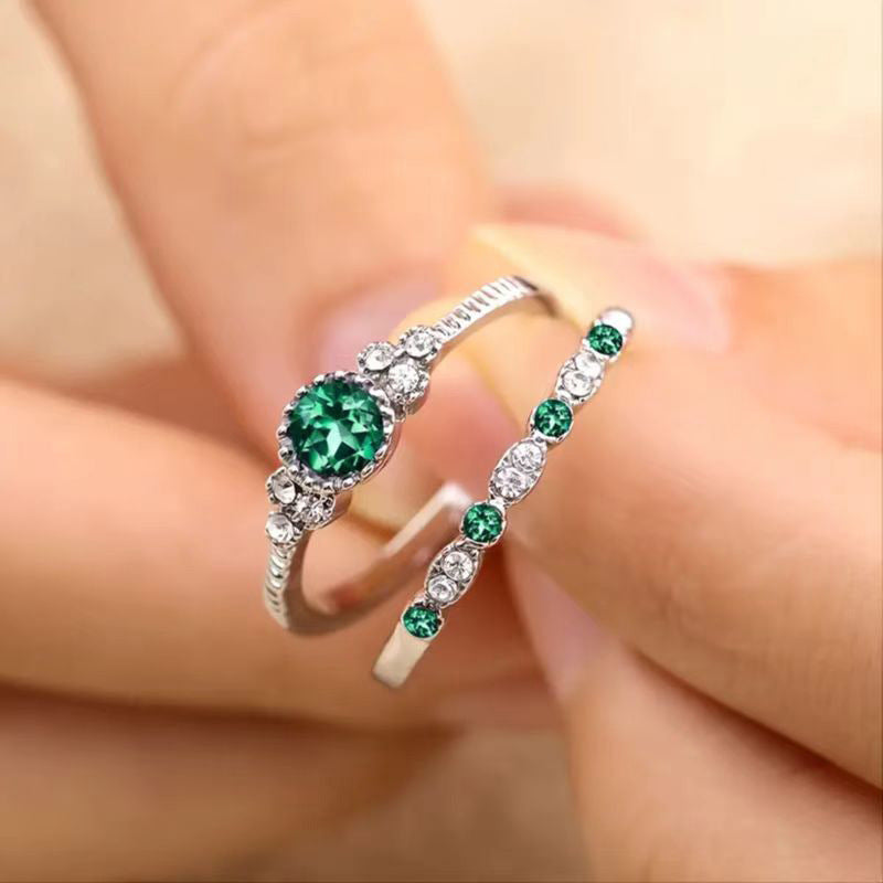 Damen glamouröser Ring mit grünem Edelstein und feinen Zirkoniasteinen Shop Nory