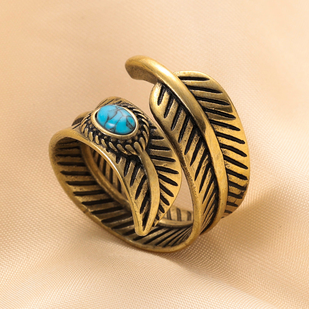 Damen Ring mit doppeltem Blattmotiv und hochwertigem Türkisstein Shop Nory