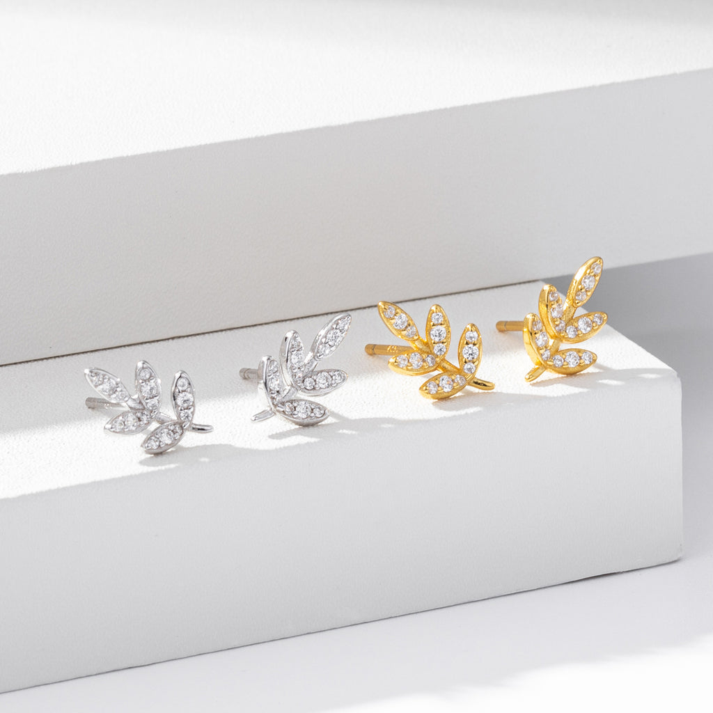 Damen Ohrstecker im eleganten Blatt-Design mit funkelnden Zirkonia Shop Nory