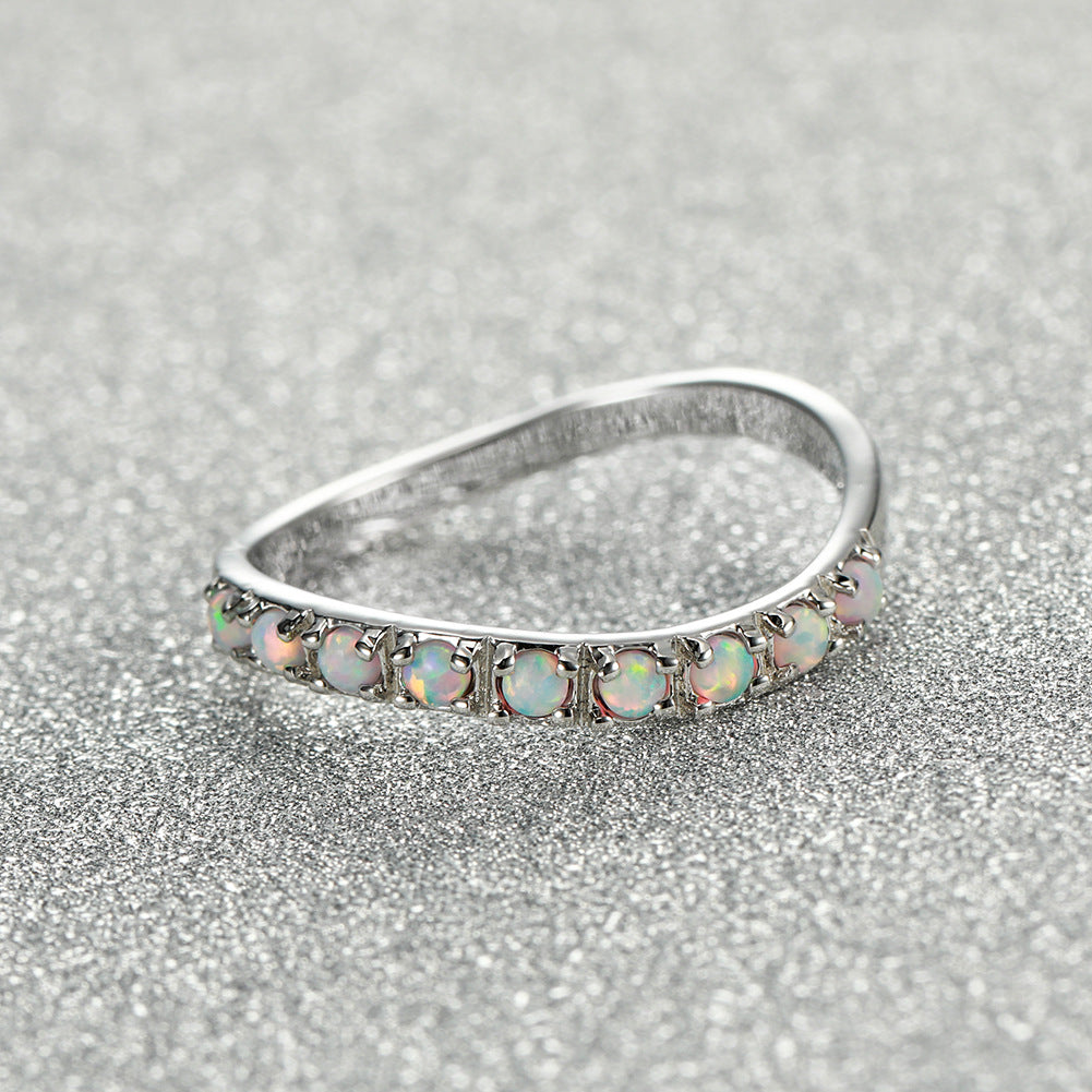 Damen Ring mit funkelnden opalisierenden Steinen Shop Nory
