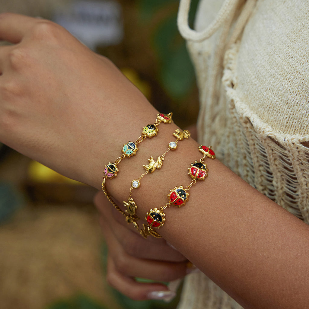 Damen Armband mit bunten Marienkäfer-Anhängern aus Edelstahl Shop Nory