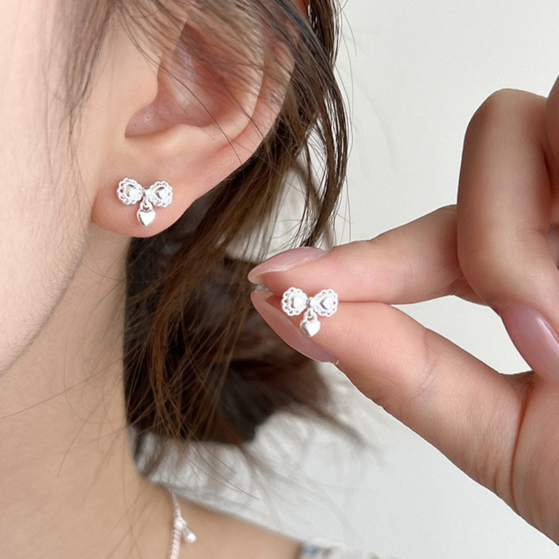 Damen Ohrstecker mit herzförmigem und filigranem Design Shop Nory