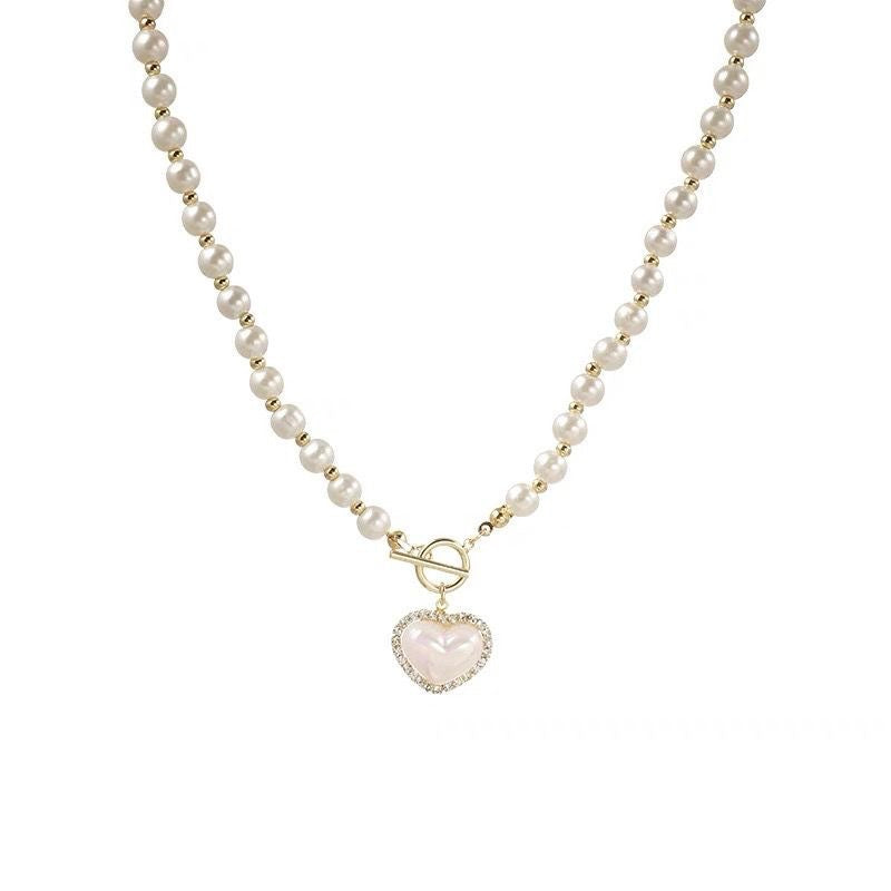 Damen Halskette mit klassischem Perlen-Design und Herzanhänger Shop Nory