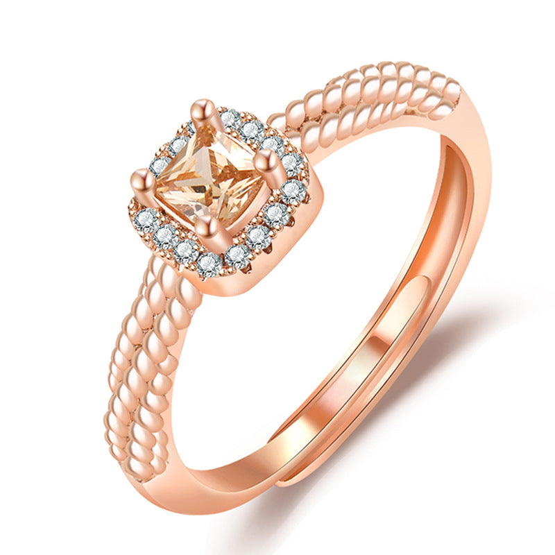 Damenring mit kunstvollem Zirkonia-Besatz und elegantem Golddesign Shop Nory