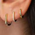 Damen Ohrstecker-Set mit stilvollem geschwungenen Design und funkelnden Akzenten Shop Nory