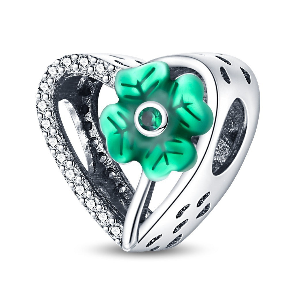 Filigraner Herz-Charms Anhänger mit Rosenmotiv und Zirkonia