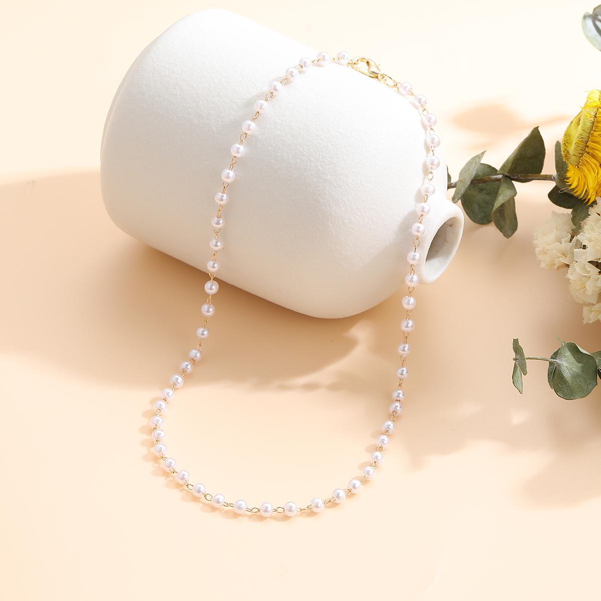 Damen Choker-Halskette mit feinen Perlen und eleganten Akzenten Shop Nory