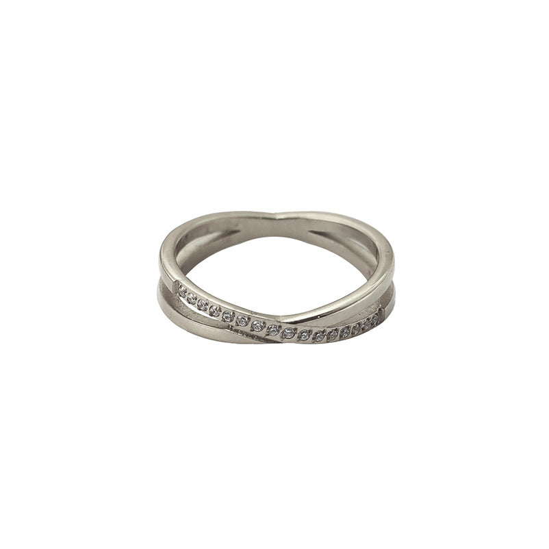 Damen zierlicher geschwungener Ring mit funkelnden Zirkonia Shop Nory