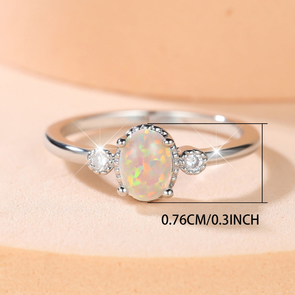 Damen Ring mit schimmerndem Opal und funkelnden Zirkonia Shop Nory