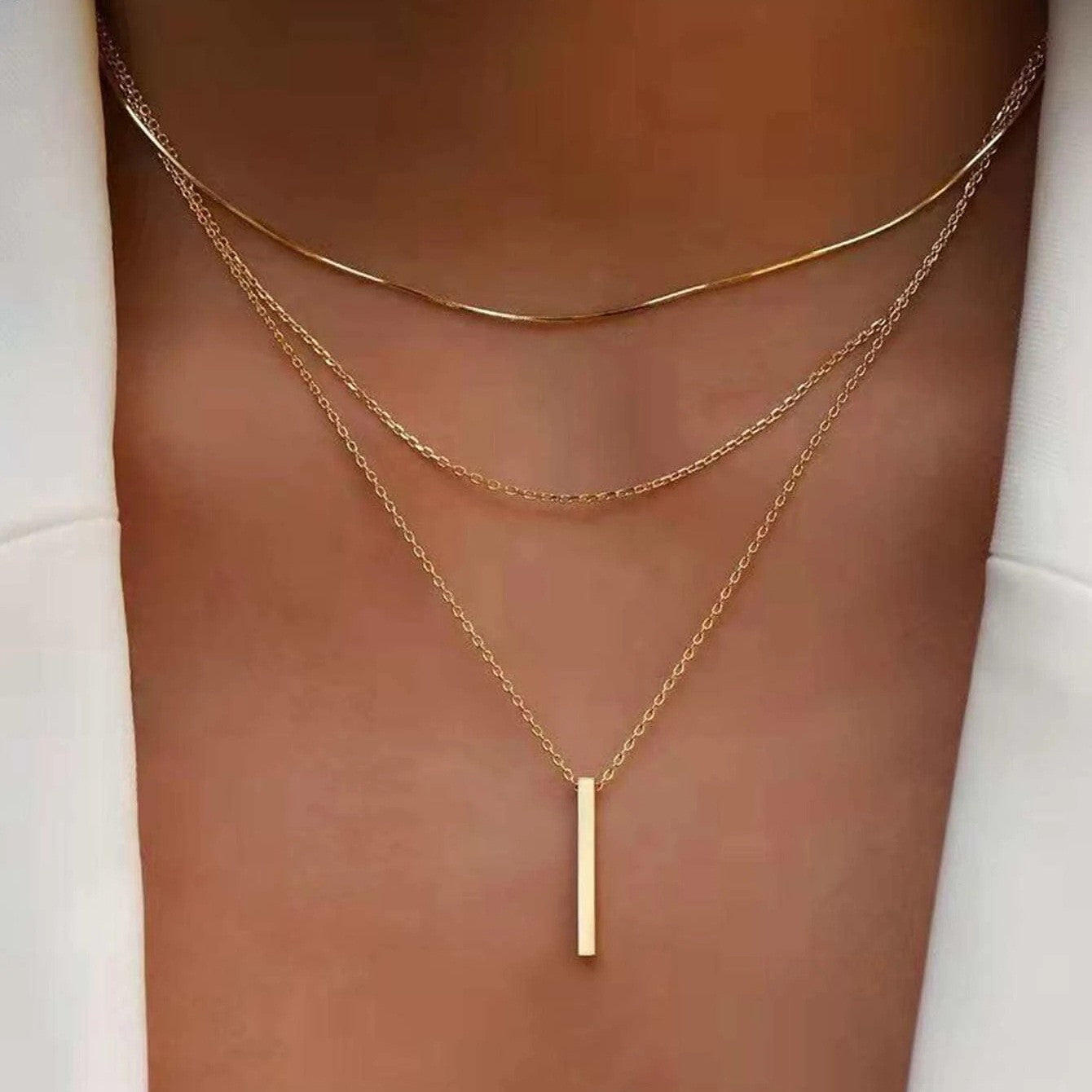 Damen mehrlagige Kette mit funkelndem Anhänger und filigranen Details Shop Nory