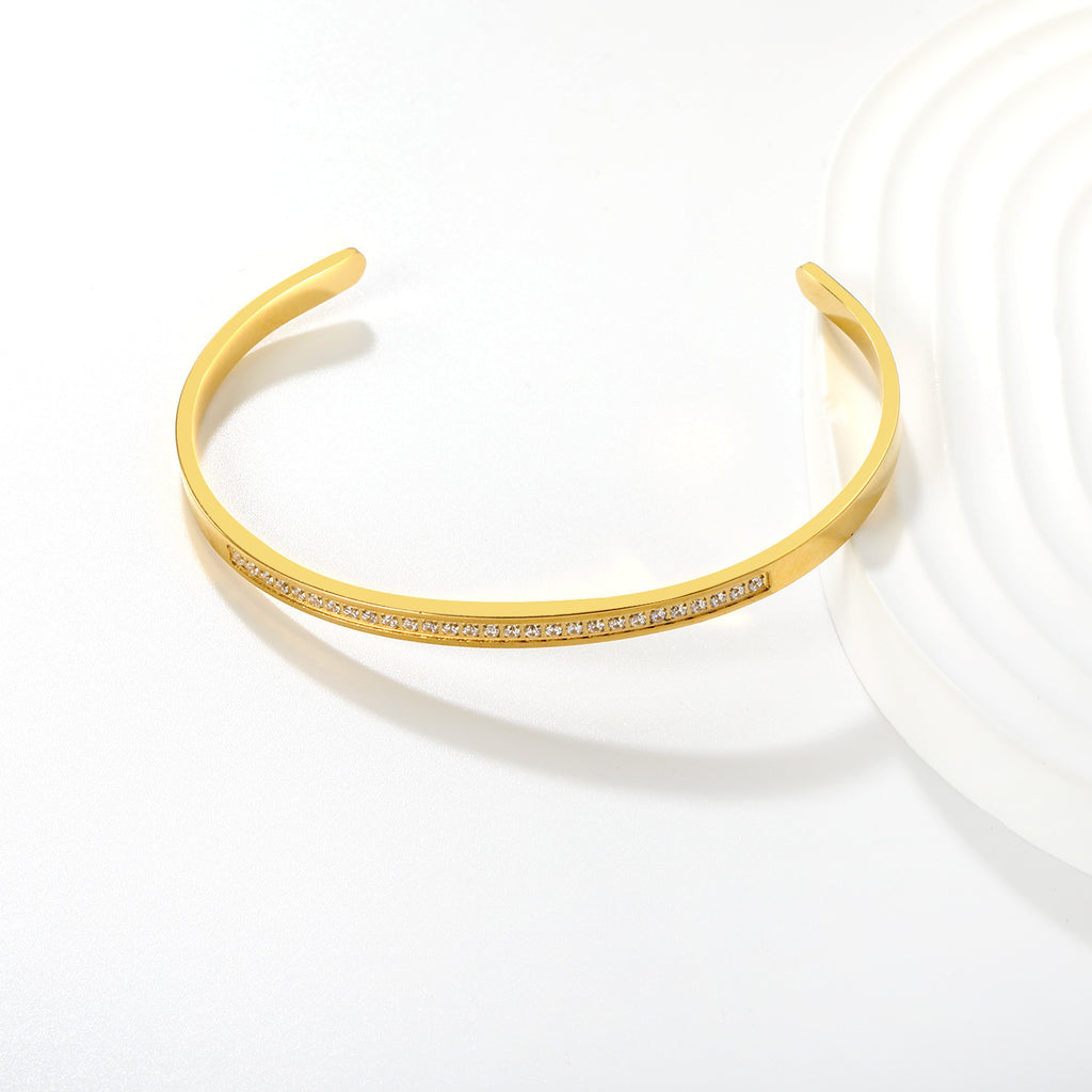 Damen Armreif mit funkelnden Zirkonia und elegantem Goldfinish Shop Nory