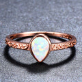 Damen Ring mit tropfenförmigem Opal und filigraner Zirkonia-Verzierung Shop Nory