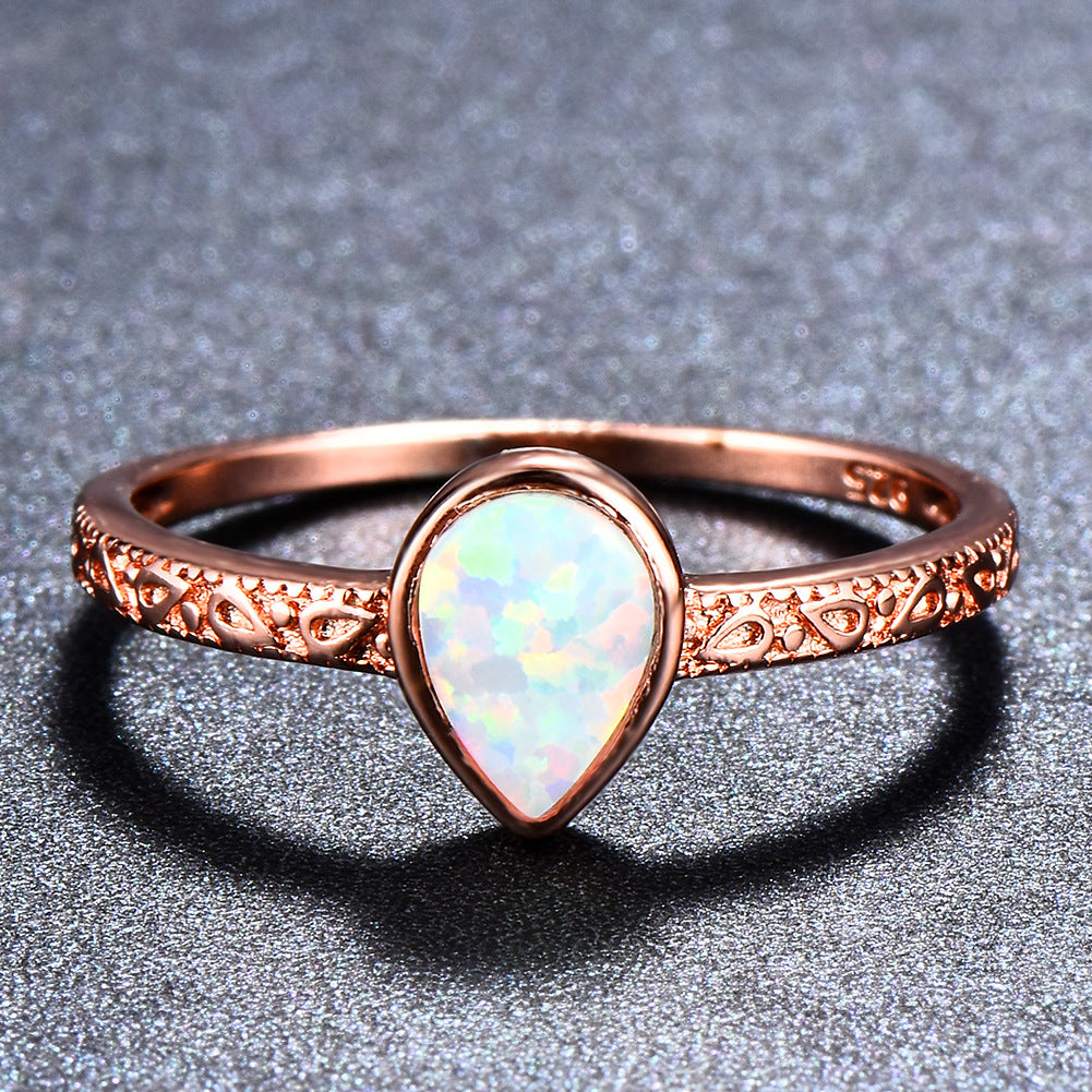 Damen Ring mit tropfenförmigem Opal und filigraner Zirkonia-Verzierung Shop Nory