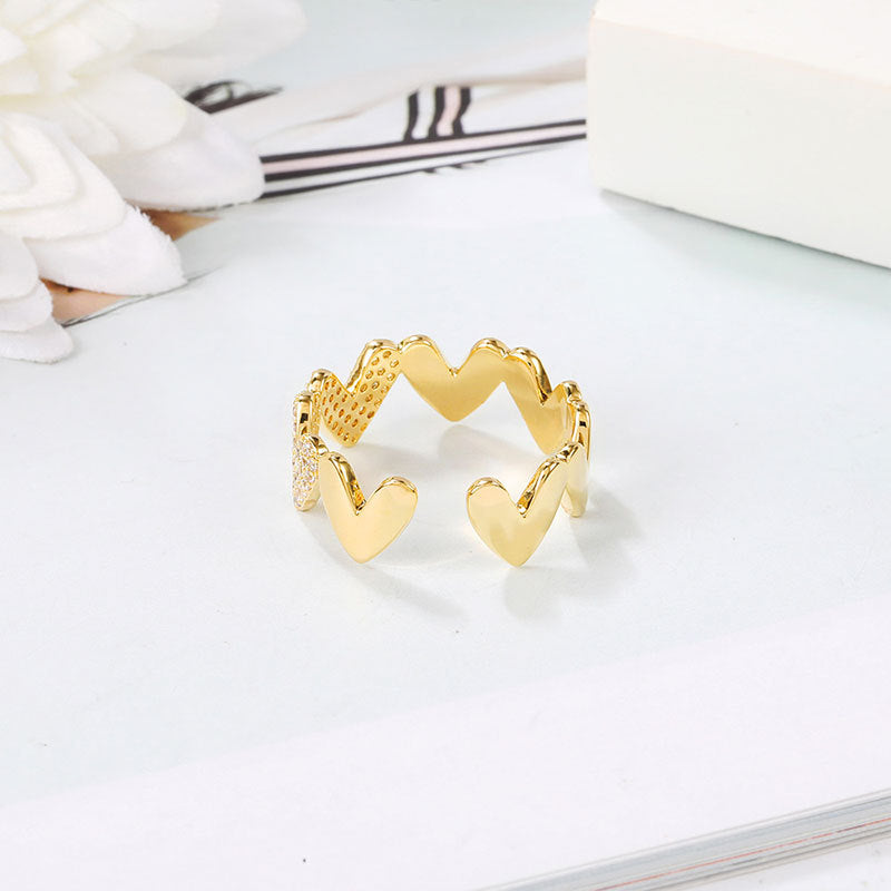 Damenring mit herzförmigem Design und funkelnden Zirkoniasteinen Shop Nory