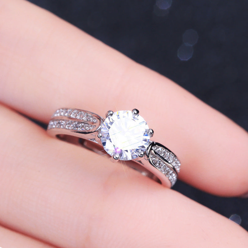 Damenring mit funkelndem Zirkonia und elegantem Band Shop Nory