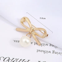 Goldene Schleife mit Perle (Legierung)