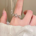 Damen Zarter Blumenring mit funkelnden Zirkonia-Steinen Shop Nory