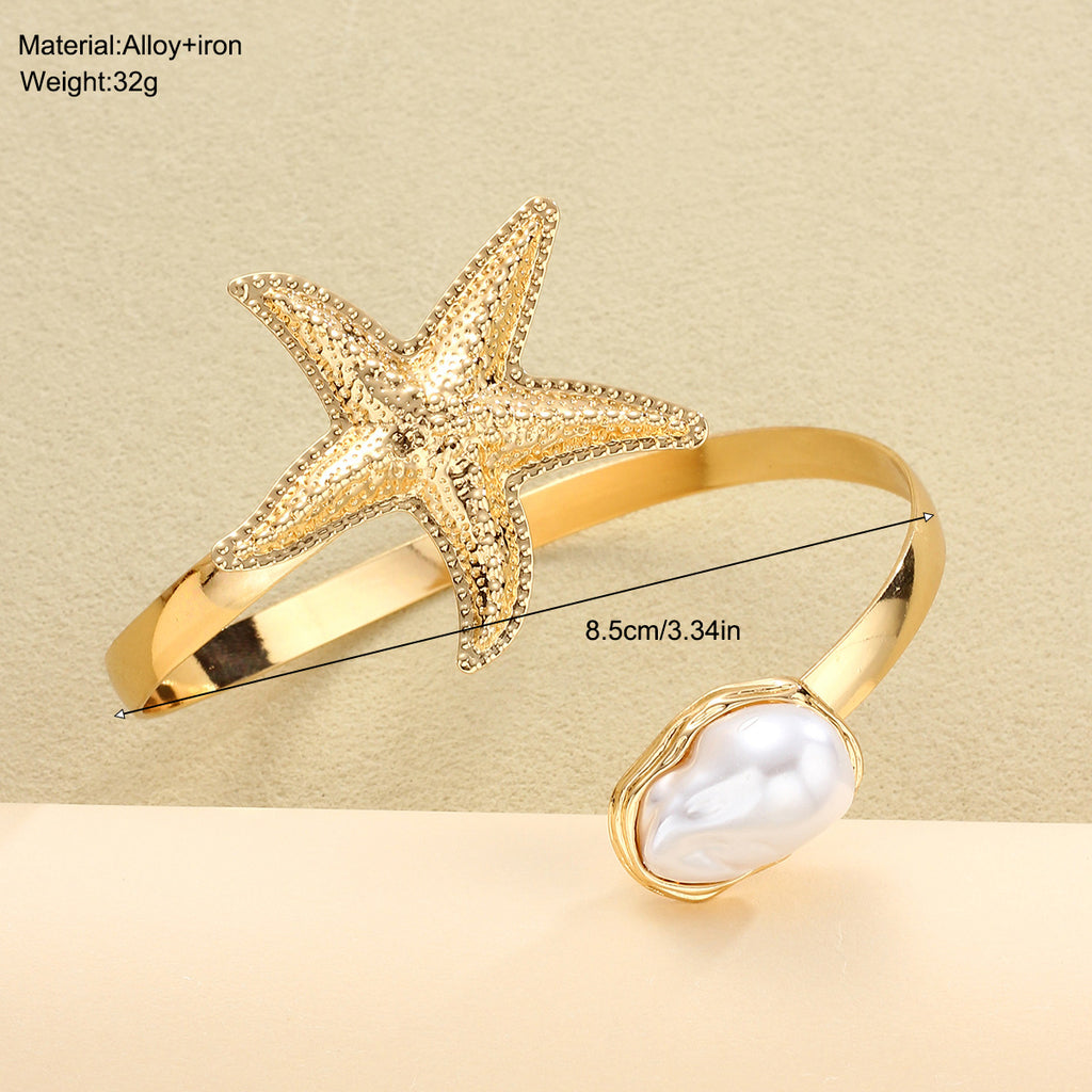 Damenarmband mit maritimen Sternen- und Perlenmotiven Shop Nory