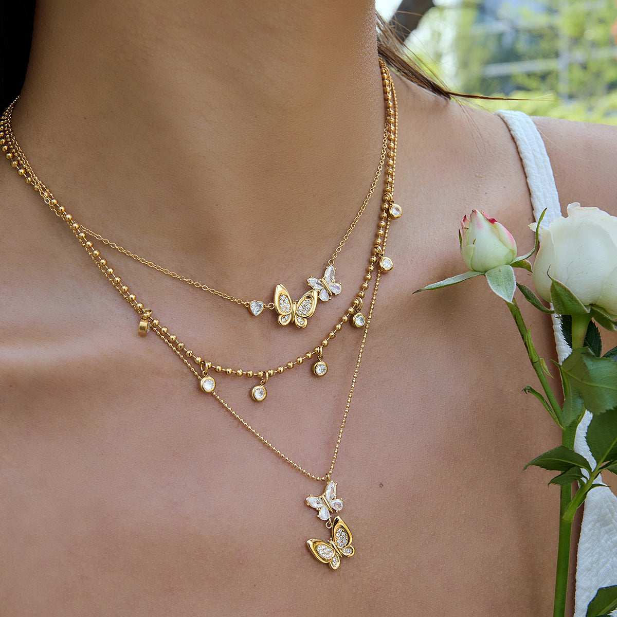 Damen Halskette mit filigranem Schmetterlingsanhänger aus hypoallergenem Edelstahl Shop Nory