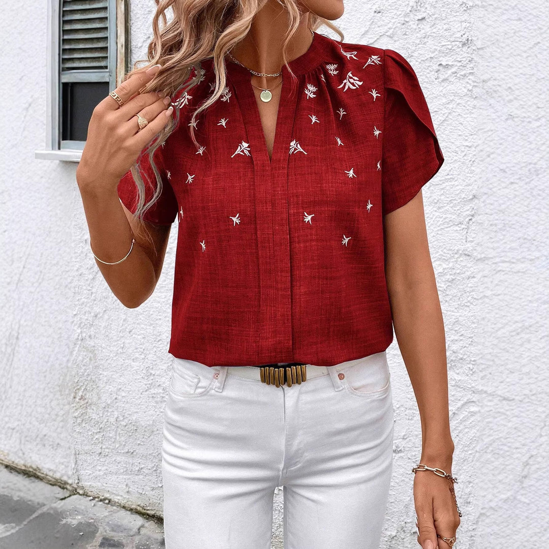 Damen Kurzbluse aus Leinenoptik mit Stehkragen, Zierfalte und floraler Stickerei Shop Nory