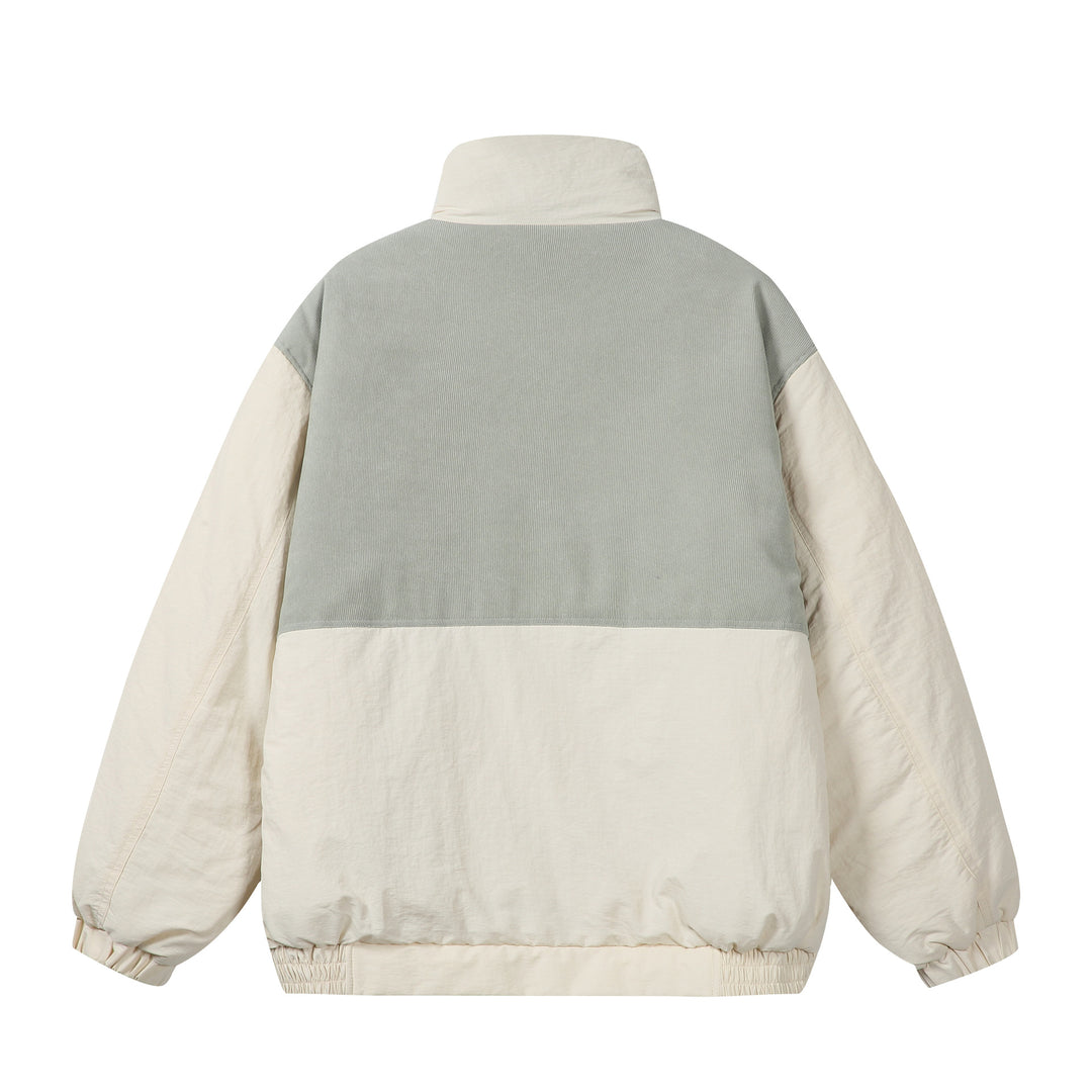 Unisex Boxy-Pufferblouson mit hohem Stehkragen, Cord-Schulterpasse und großen Pattentaschen Shop Nory