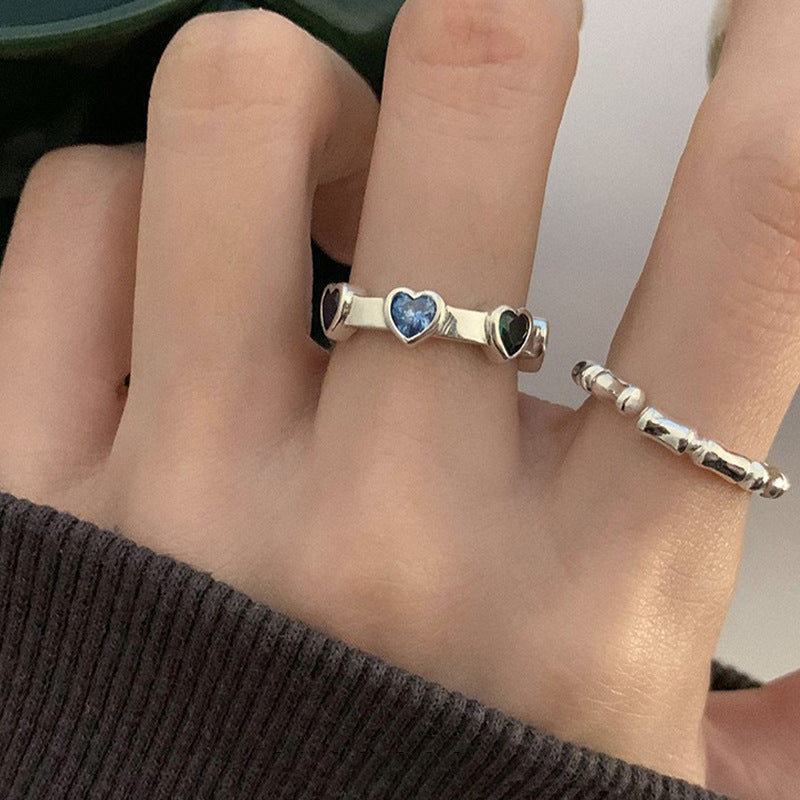 Damenring mit herzförmigen Steinchen und elegantem Design Shop Nory