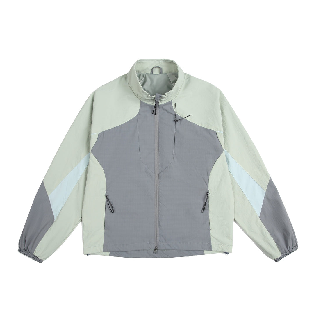 Unisex Leichte Windjacke mit hohem Kragen, Farbmix‑Paneelen und verstellbarem Saum Shop Nory