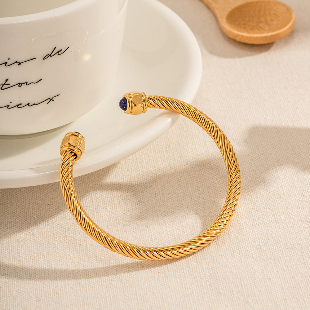 Damen Offenes Armreif mit elegantem Drahtdesign und wertvollen Edelsteinakzenten Shop Nory