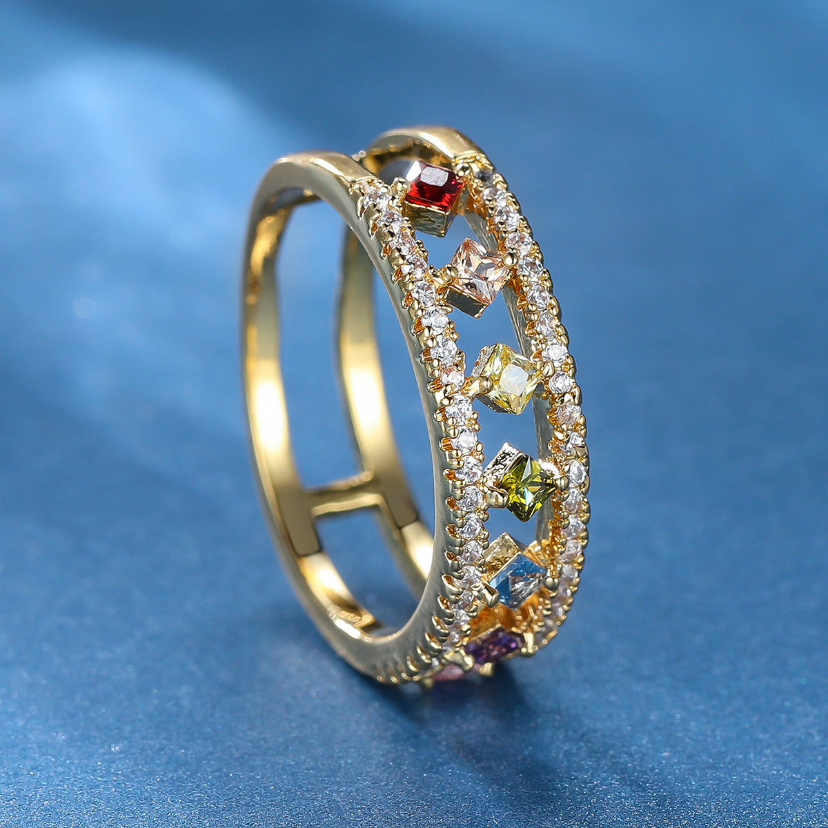 Damen Ring mit funkelnden, farbigen Zirkonia und eleganter Goldfassung Shop Nory