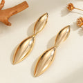 Damen Ohrringe im geschwungenen, skulpturalen Design Shop Nory