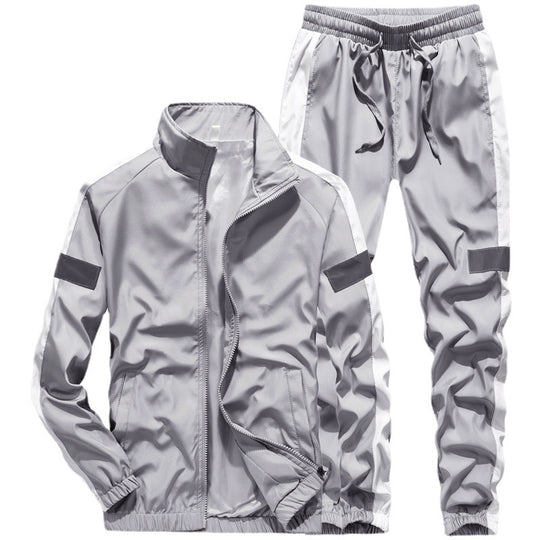 Herren Sportives Freizeit-Trainingsanzug-Set aus leichtem Windbreaker-Material mit Kontraststreifen und reflektierenden Einsätzen Shop Nory