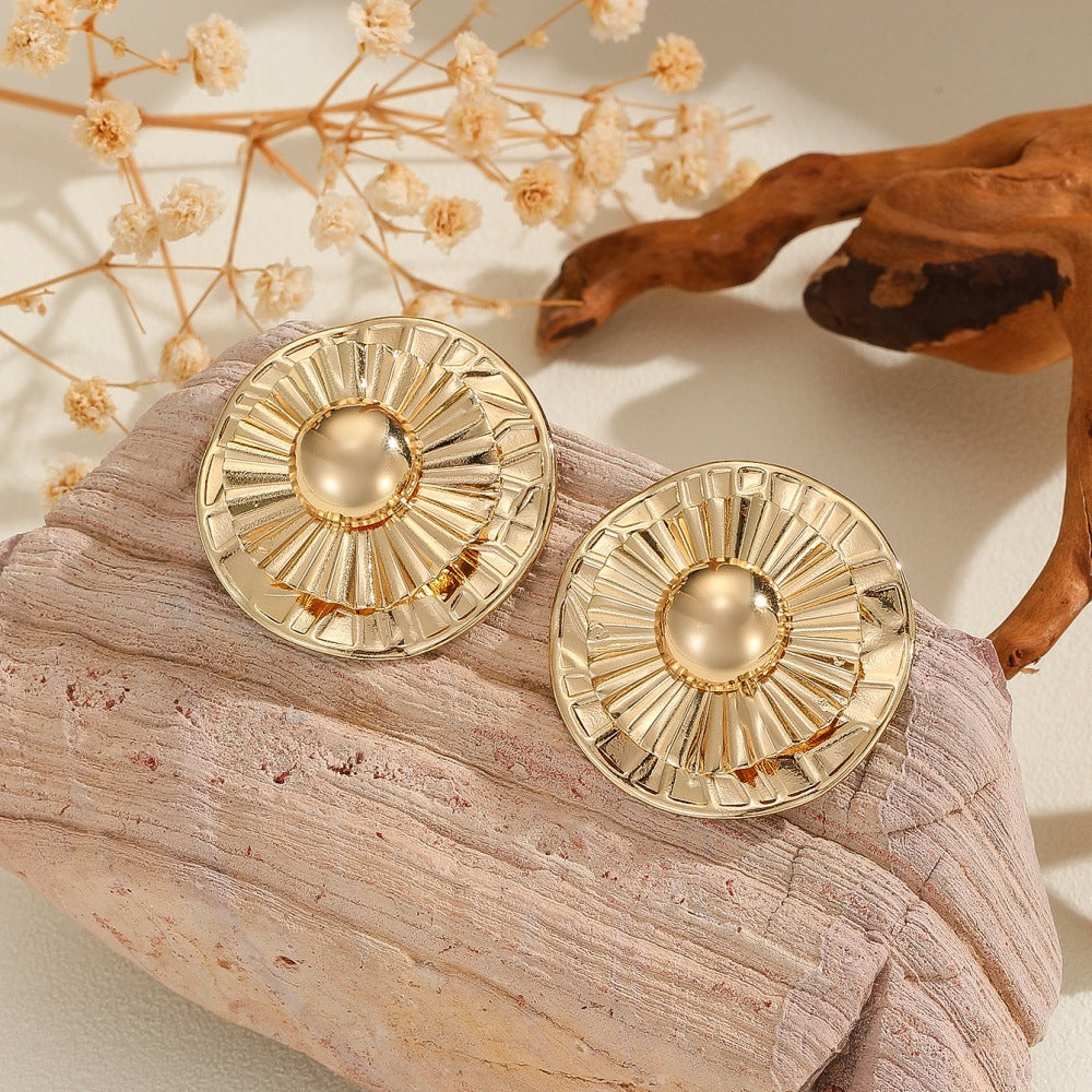 Damen Ohrclips mit kunstvoller goldener Struktur Shop Nory