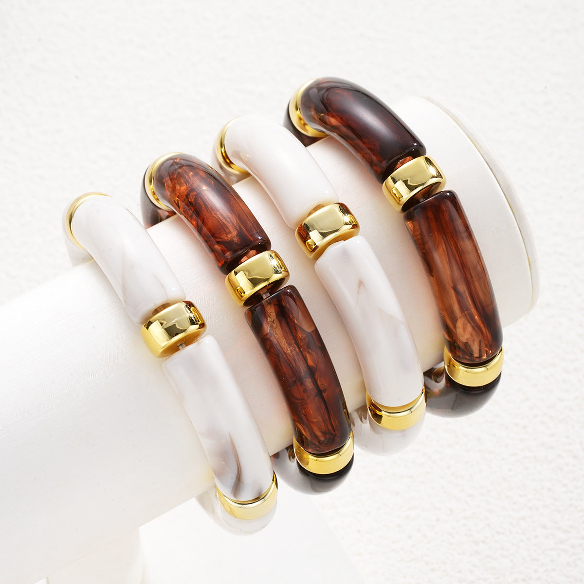 Damen Armreif-Set mit luxuriösen Acrylelementen und goldenen Akzenten Shop Nory
