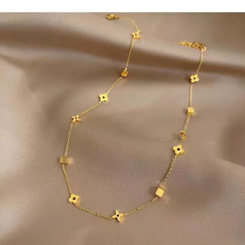 Damen Blumen-inspiriertes goldfarbenes Kettenhalsband Shop Nory