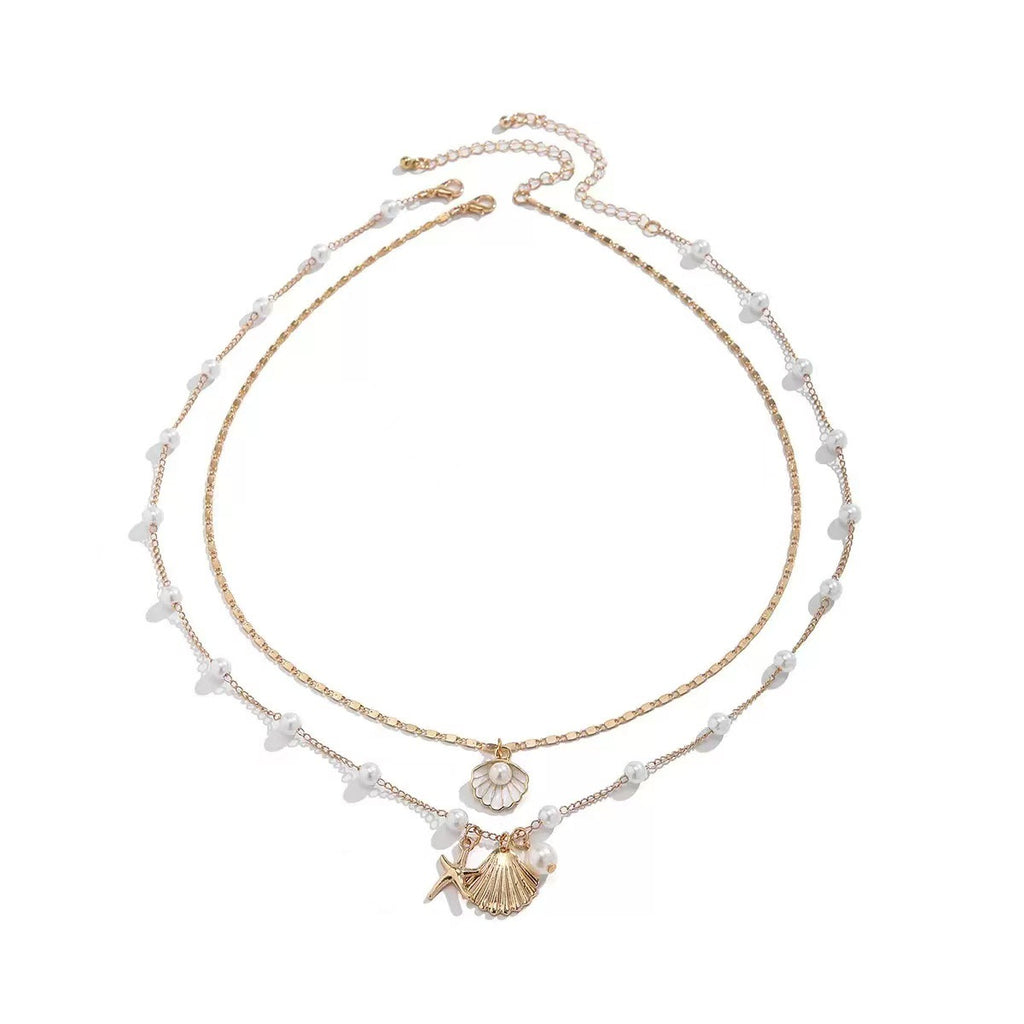 Damen mehrlagige Halskette mit Muschelanhängern und eleganten Perlen-Details Shop Nory