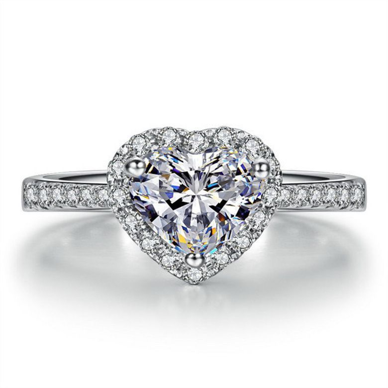 Damen eleganter Ring mit funkelndem Solitär und verspieltem Zirkonia-Besatz Shop Nory