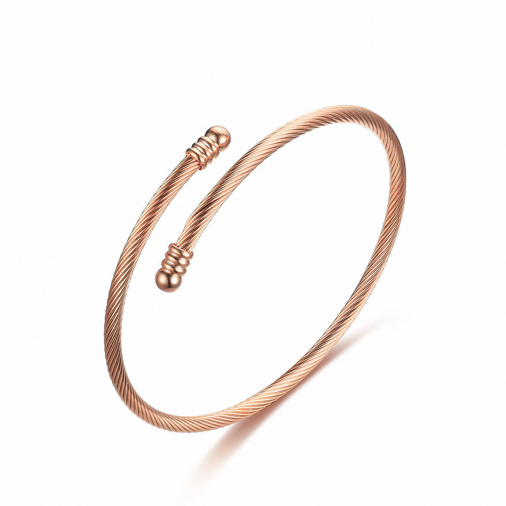 Damen Armreif mit stilvollem Herzanhänger aus hochwertigem Edelstahl Shop Nory