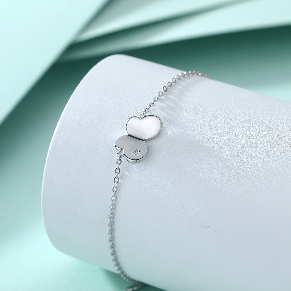 Damenarmband mit elegantem Schmetterlingsmotiv und funkelndem Stein Shop Nory
