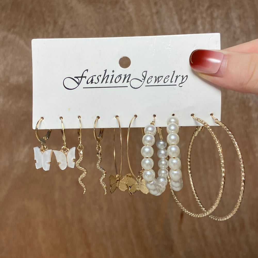 Damen Ohrringe Set mit elegantem Perlendesign und funkelnden Goldakzenten Shop Nory