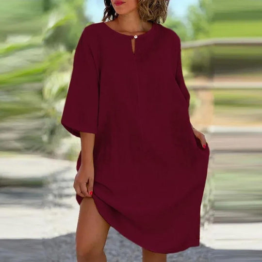 Damen luftig geschnittenes Kleid mit praktischen Taschen und elegantem Ausschnitt