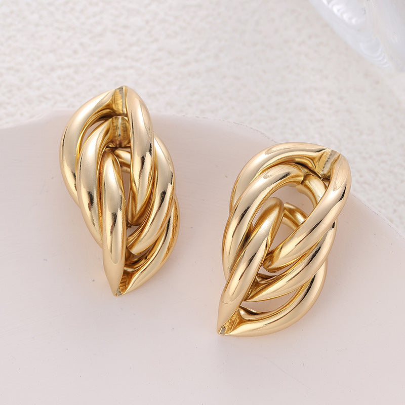 Damen Ohrringe mit elegantem gedrehten Design Shop Nory