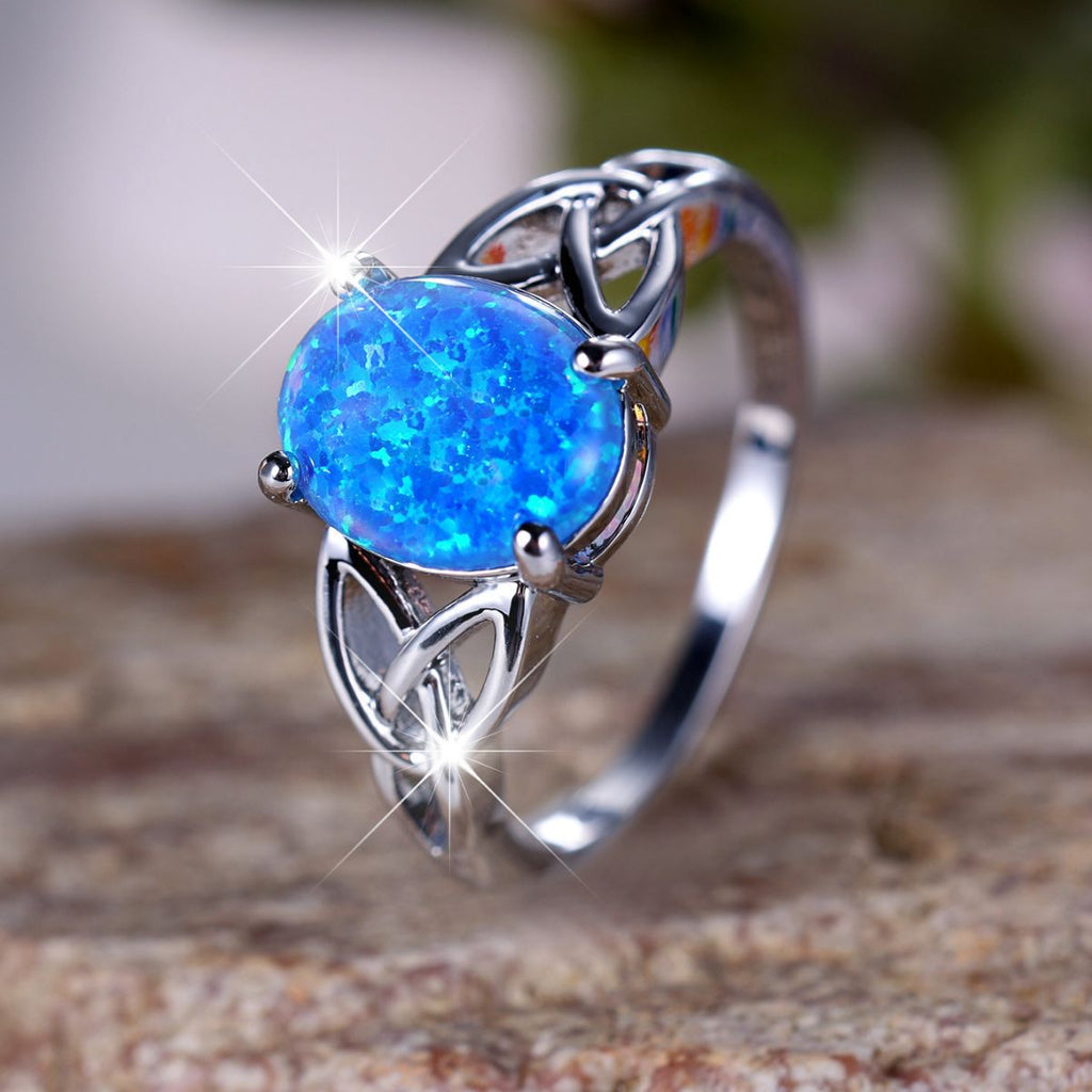 Damen Ring mit schimmerndem Opal und eleganter Zirkonia-Fassung Shop Nory