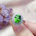 Damen Zierlicher Ring mit ovalem, strahlendem Edelstein und funkelndem Zirkonia-Besatz Shop Nory