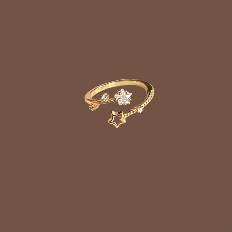 Damen Verspielter Ring mit funkelnden Sternen und Zirkonia Shop Nory
