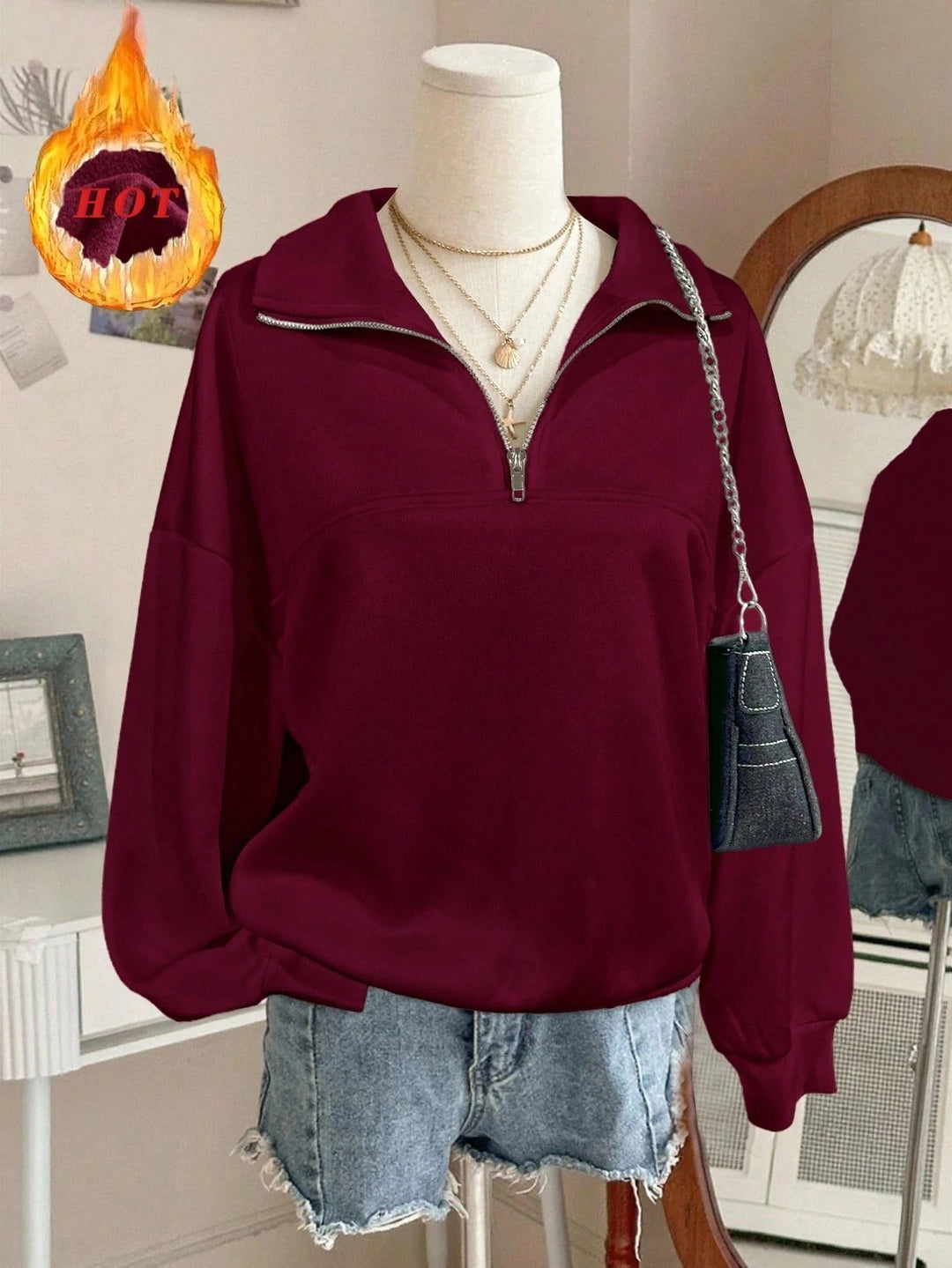 Damen nan Oversize Sweatshirt mit halbem Reißverschluss, Stehkragen und Ballonärmeln Shop Nory