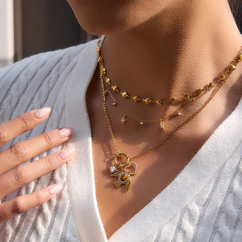 Damen Halskette mit einzigartigem Vogelanhänger und funkelnden Zirkonia-Details Shop Nory