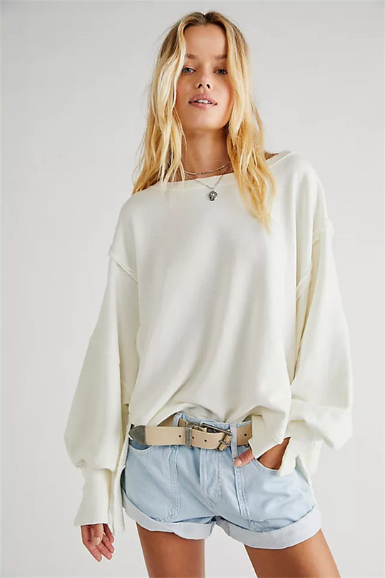 Damen oversized Sweatshirt mit Ballonärmeln, offenen Saumnähten und seitlichen Schlitzen Shop Nory