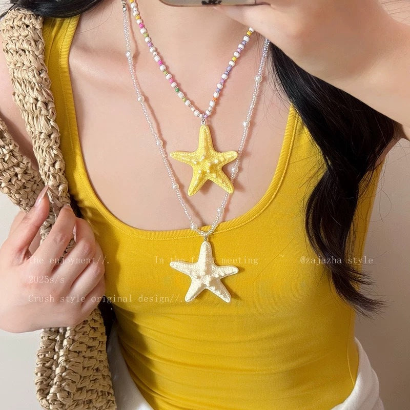 Damen Kette mit einzigartigem Sternenanhänger und buntem Perlenmuster Shop Nory