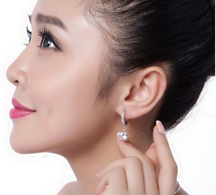 Damen Ohrringe mit funkelndem Zirkonia-Anhänger und eleganter Fassung Shop Nory