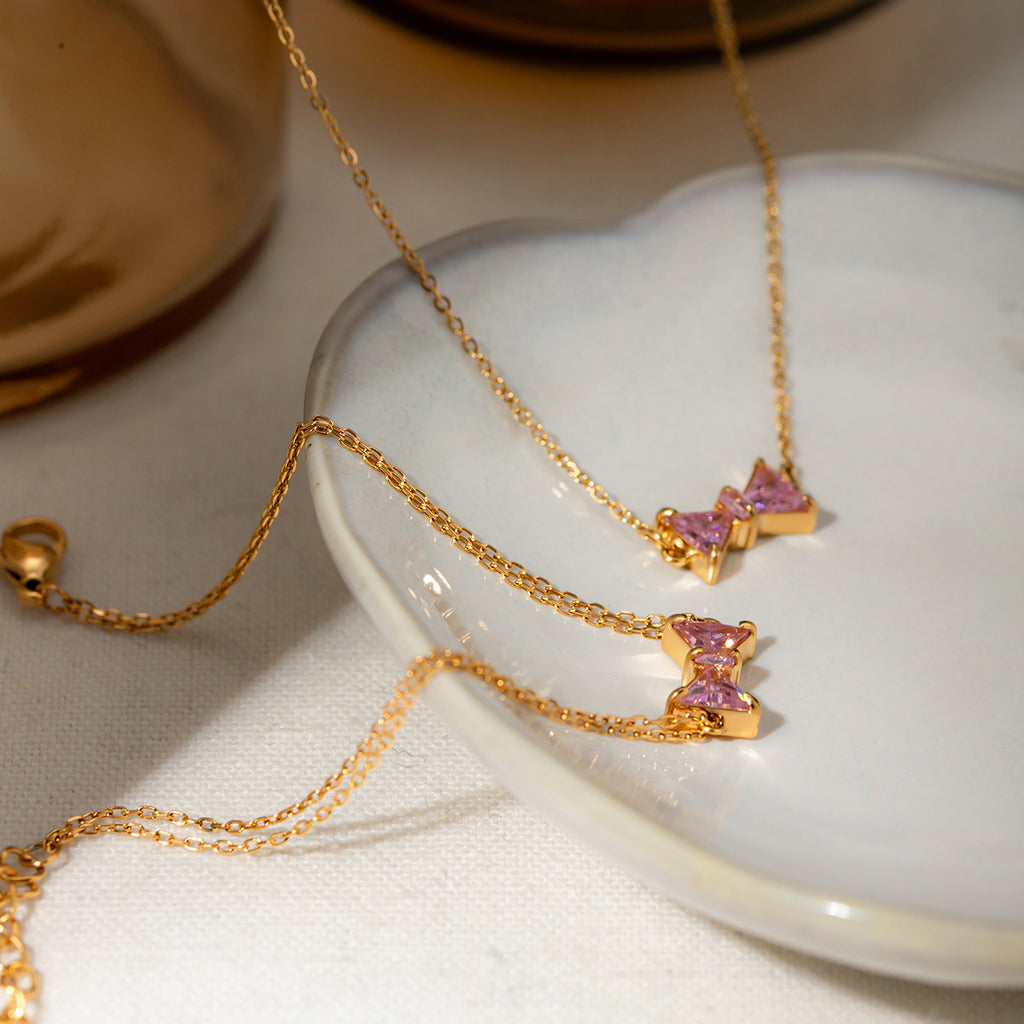 Damen Halskette mit elegantem Schleifenanhänger aus hochwertigem Edelstahl Shop Nory